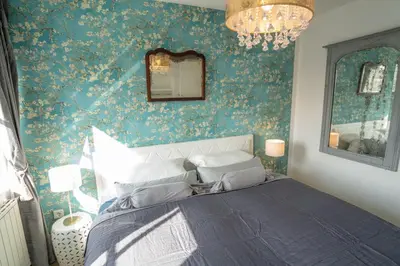 Ein Bett oder Betten in einem Zimmer der Unterkunft Villa Golding - Flat 3