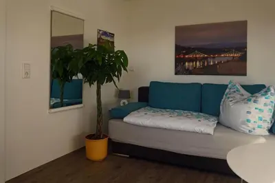 Ein Bett oder Betten in einem Zimmer der Unterkunft FeWo „Zum Napoleonstein“