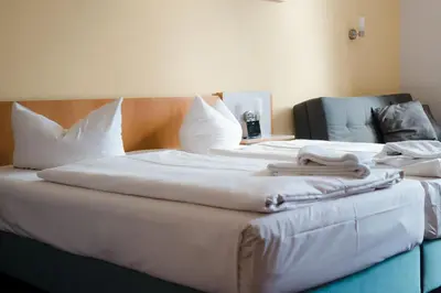 Ein Bett oder Betten in einem Zimmer der Unterkunft Aktiv-Hotel Stock & Stein