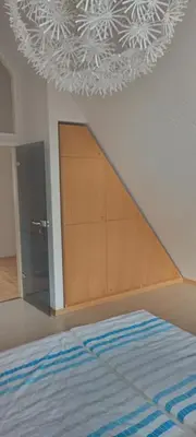 Ein Bett oder Betten in einem Zimmer der Unterkunft Winzerhaus Rissweg 15