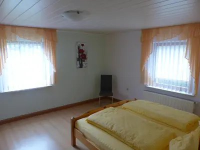 Ein Bett oder Betten in einem Zimmer der Unterkunft Apartment view of fortress in Pirna