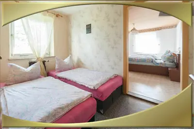 Ein Bett oder Betten in einem Zimmer der Unterkunft Ferienwohnung
