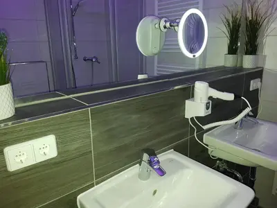 Ein Badezimmer in der Unterkunft Pension Hoefti