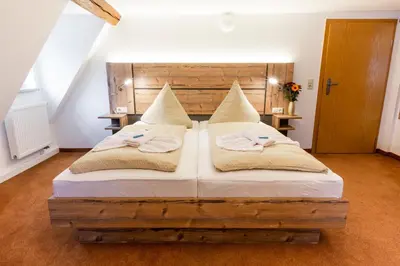 Ein Bett oder Betten in einem Zimmer der Unterkunft Waldgasthof Bad Einsiedel