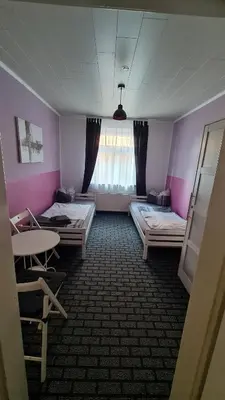 Ein Bett oder Betten in einem Zimmer der Unterkunft Ferienwohnung Charlett