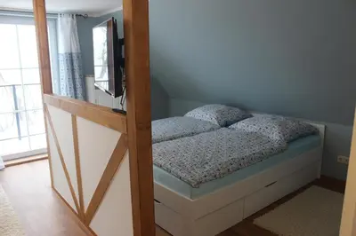 Ein Bett oder Betten in einem Zimmer der Unterkunft Festung Märcz