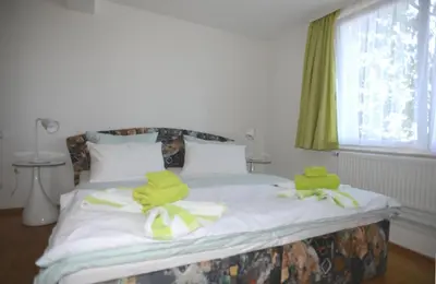 Ein Bett oder Betten in einem Zimmer der Unterkunft Schöne Höhe