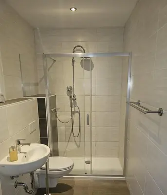 Ein Badezimmer in der Unterkunft Hotel Sonnenschein