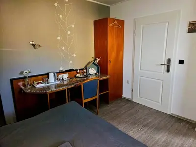 Ein Bett oder Betten in einem Zimmer der Unterkunft Hotel Sonnenschein