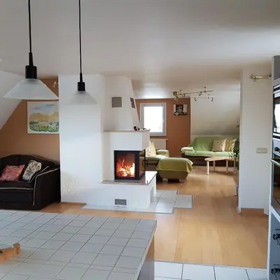 Ein Sitzbereich in der Unterkunft Ferienwohnung Goldene Höhe