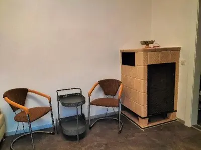 Ein Sitzbereich in der Unterkunft Pension Rosenvilla