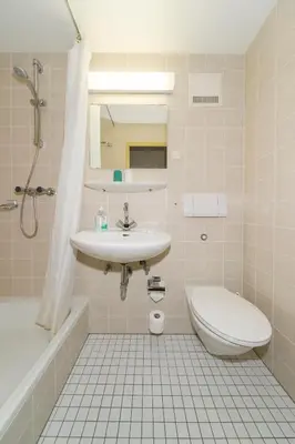 Ein Badezimmer in der Unterkunft Hotel Heidler