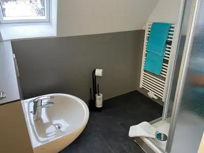 Ein Badezimmer in der Unterkunft Gästehaus Graupner-Mittweida