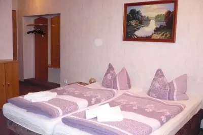 Ein Bett oder Betten in einem Zimmer der Unterkunft Gaststätte & Pension Jiedlitz
