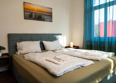 Ein Bett oder Betten in einem Zimmer der Unterkunft Apartmenthaus Rankestraße 4