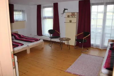 Ein Bett oder Betten in einem Zimmer der Unterkunft Bärchenhof