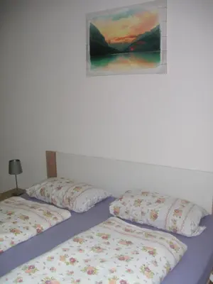 Ein Bett oder Betten in einem Zimmer der Unterkunft Ferienwohnung in Döbeln