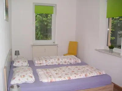 Ein Bett oder Betten in einem Zimmer der Unterkunft Ferienwohnung in Döbeln