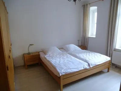 Ein Bett oder Betten in einem Zimmer der Unterkunft Sunny Escape in Borstendorf