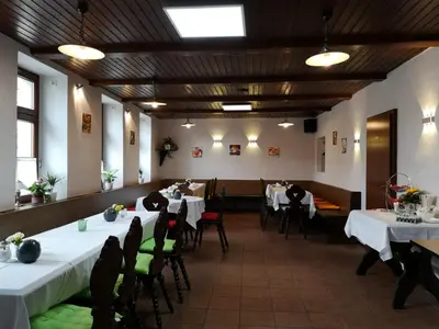 Ein Restaurant oder anderes Speiselokal in der Unterkunft Pension Zentrum Riesa