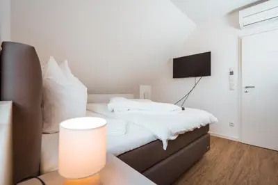 Ein Bett oder Betten in einem Zimmer der Unterkunft Haus Seeweg