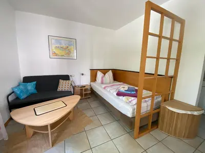 Ein Bett oder Betten in einem Zimmer der Unterkunft Apartmenthaus Home24