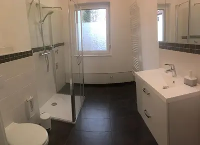 Ein Badezimmer in der Unterkunft zentral gelegene top ausgestattete Wohnung