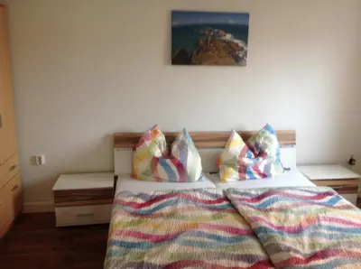 Ein Bett oder Betten in einem Zimmer der Unterkunft Kipsenblick