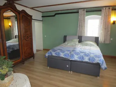 Ein Bett oder Betten in einem Zimmer der Unterkunft Gasthaus Ruebenau