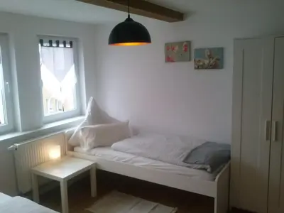 Ein Bett oder Betten in einem Zimmer der Unterkunft Ferienwohnung Konrad - nahe Chemnitz