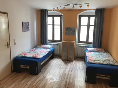 Ein Bett oder Betten in einem Zimmer der Unterkunft Apartments at Old Town Bridge Altstadt, Elbestrand, Fahrradweg, Schiffsanleger