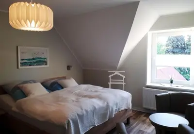 Ein Bett oder Betten in einem Zimmer der Unterkunft Pension Marina