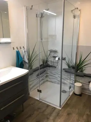 Ein Badezimmer in der Unterkunft FeWo Altwahnsdorf