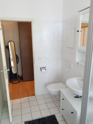 Ein Badezimmer in der Unterkunft Avenue Apartment - Hilbersdorfer Straße