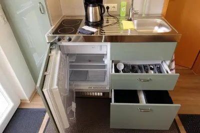 Küche/Küchenzeile in der Unterkunft Campus Apartment Ernst