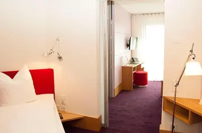 Ein Bett oder Betten in einem Zimmer der Unterkunft TraumHaus im Elsterpark
