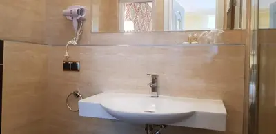 Ein Badezimmer in der Unterkunft Hotel-Villa Lalee