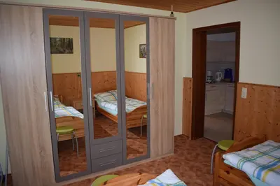 Ein Bett oder Betten in einem Zimmer der Unterkunft Ferienwohnung Waldmühle