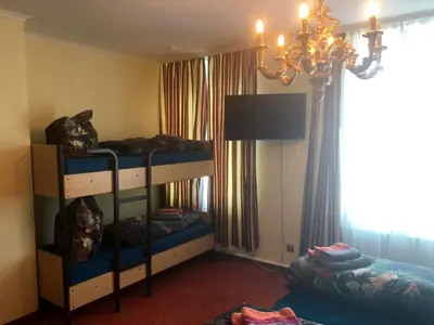 Ein Etagenbett oder Etagenbetten in einem Zimmer der Unterkunft Hotel Eulenspiegel - Das Erlebnishotel in Riesa
