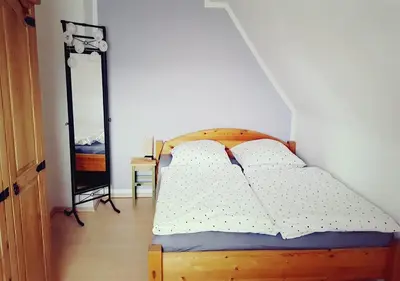 Ein Bett oder Betten in einem Zimmer der Unterkunft Ferienhaus Polly - Keine Monteure