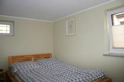 Ein Bett oder Betten in einem Zimmer der Unterkunft Quartier78