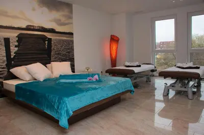 Ein Bett oder Betten in einem Zimmer der Unterkunft Riff Resort