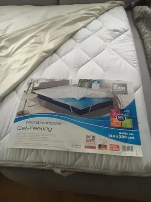 Ein Bett oder Betten in einem Zimmer der Unterkunft Ferienwohnung Eulennest