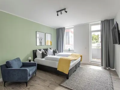 Ein Bett oder Betten in einem Zimmer der Unterkunft Limehome Chemnitz Hartmannstraße