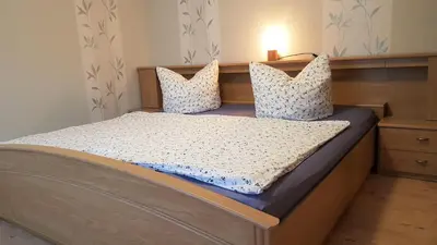 Ein Bett oder Betten in einem Zimmer der Unterkunft Ferienwohnung Nickl