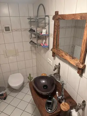 Ein Badezimmer in der Unterkunft Western-Inn