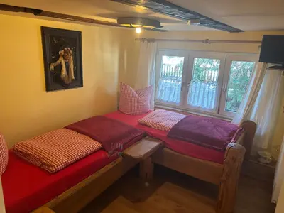 Ein Bett oder Betten in einem Zimmer der Unterkunft Western-Inn