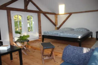 Ein Bett oder Betten in einem Zimmer der Unterkunft Ferienwohnung Goldgrund Gartenblick
