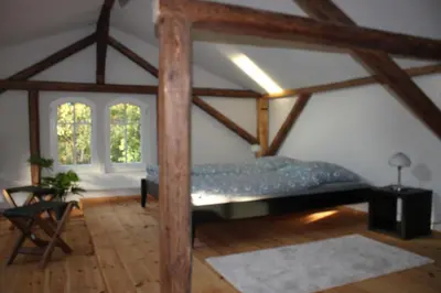 Ein Bett oder Betten in einem Zimmer der Unterkunft Ferienwohnung Goldgrund Gartenblick