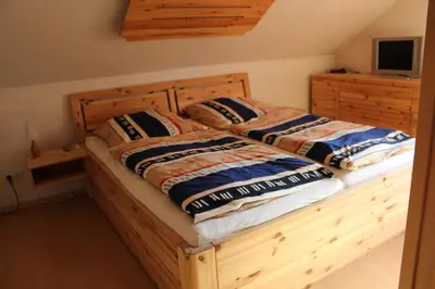 Ein Bett oder Betten in einem Zimmer der Unterkunft Ferienhaus Erika